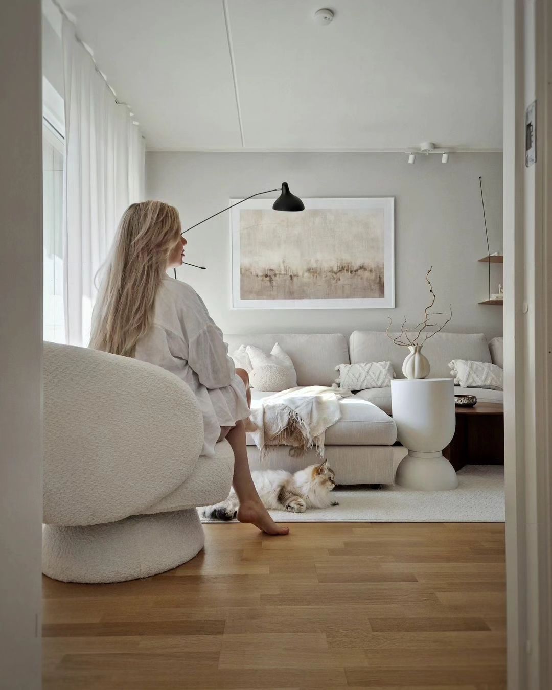 The Saboor Upholstered Swivel Barrel Chair will enhance your living space!
